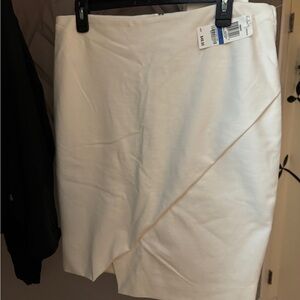 Barlll white above knee skirt. Asymmetrical look. Brand new w/tag.